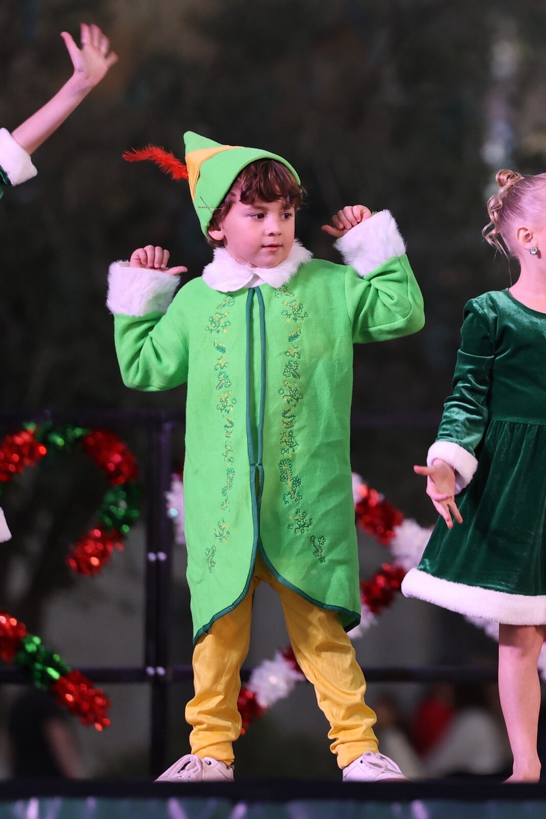 Young Project 520 dancer performing in an elf costume