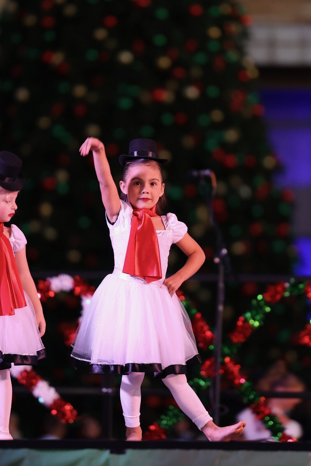 Young Project 520 dancer in a snowman-themed Christmas costume