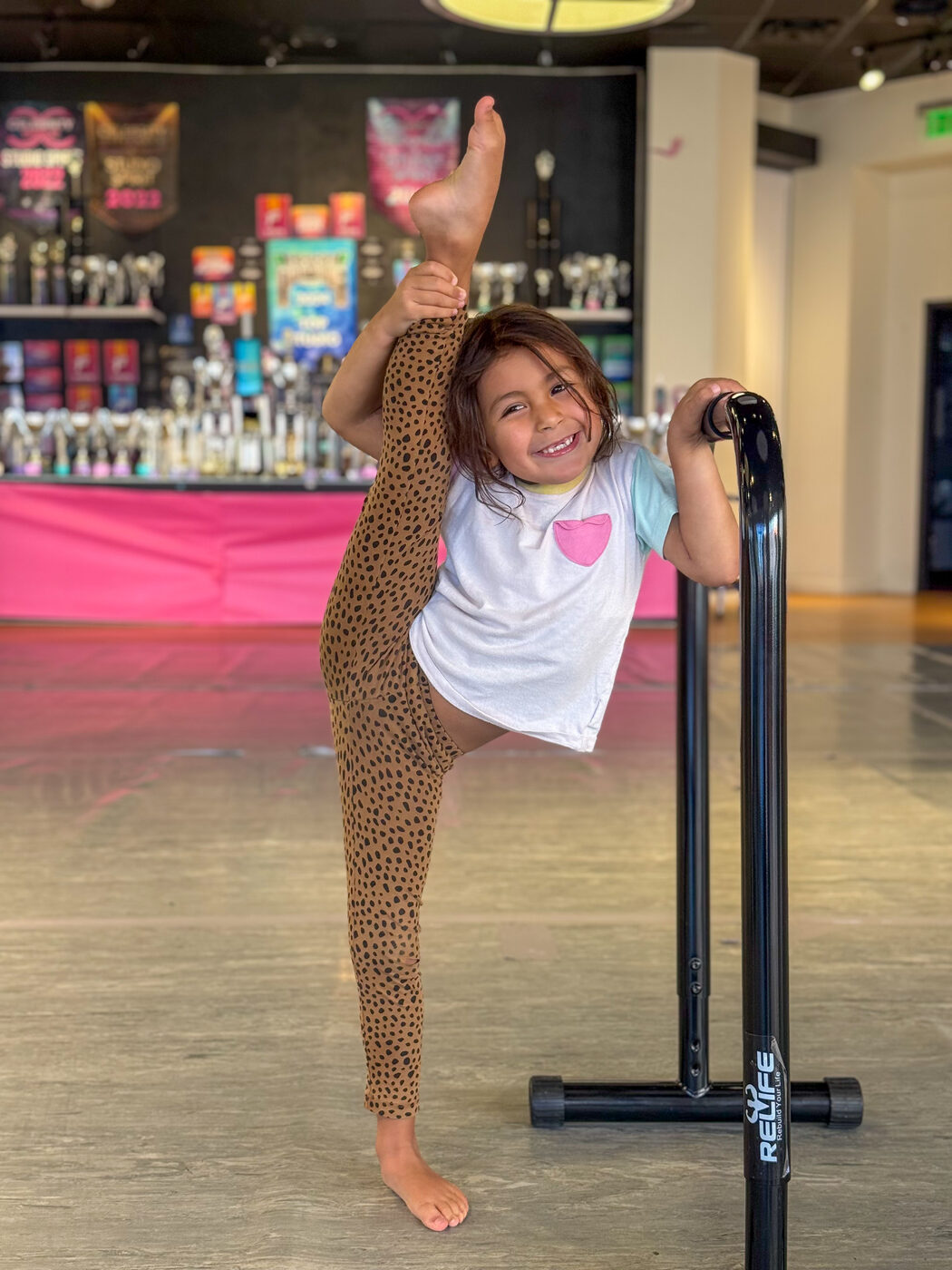 Project 520 dancer showing flexibility and confidence at the studio